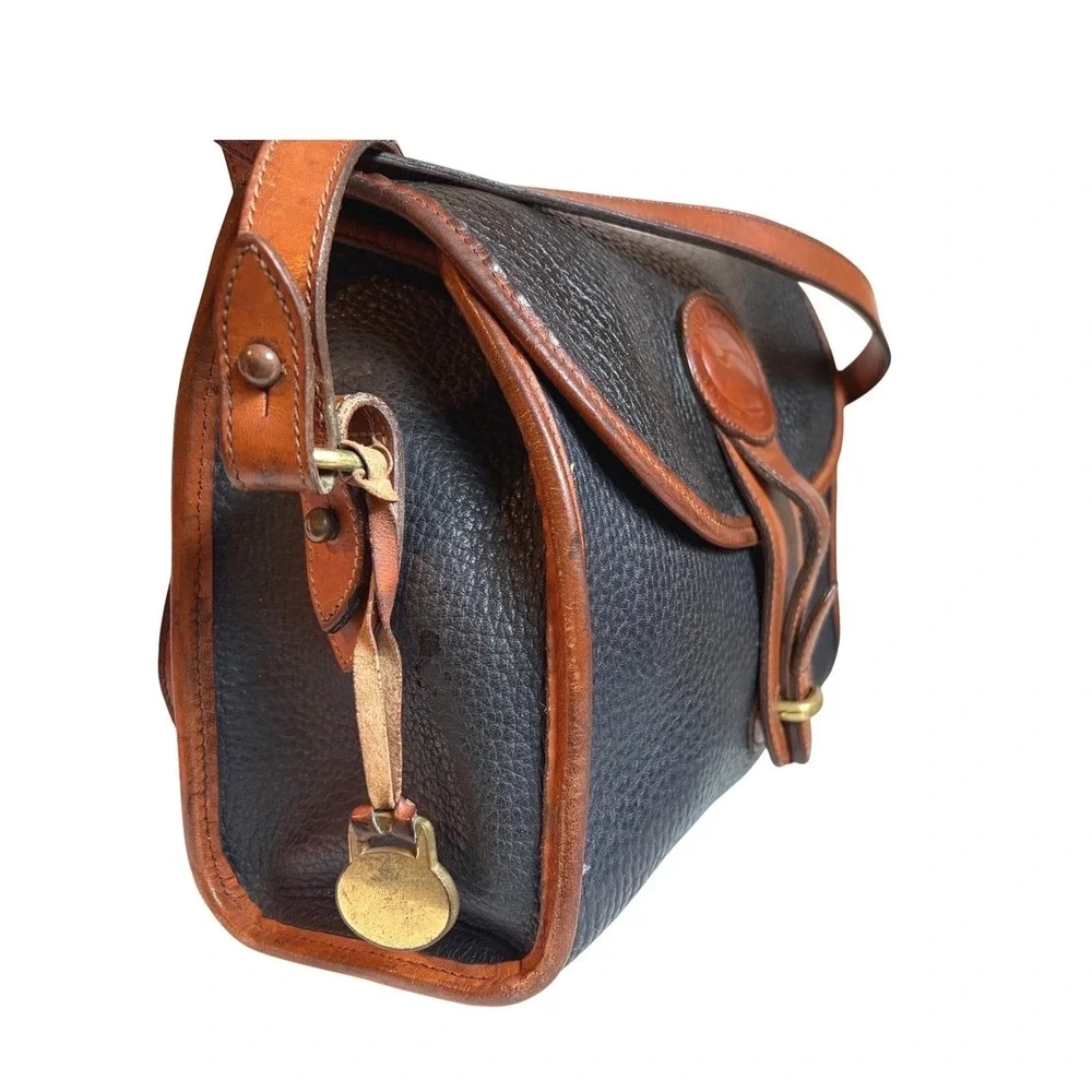 Dooney & Bourke All Weather Leather Vintage Navy‎  Crossbody Bag Brass Duck Fob